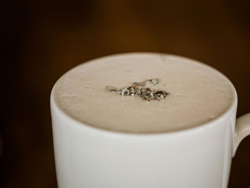 pexels-photo-2262832-2262832 A delectable creamy beverage in a white mug, perfect for a warm drink.